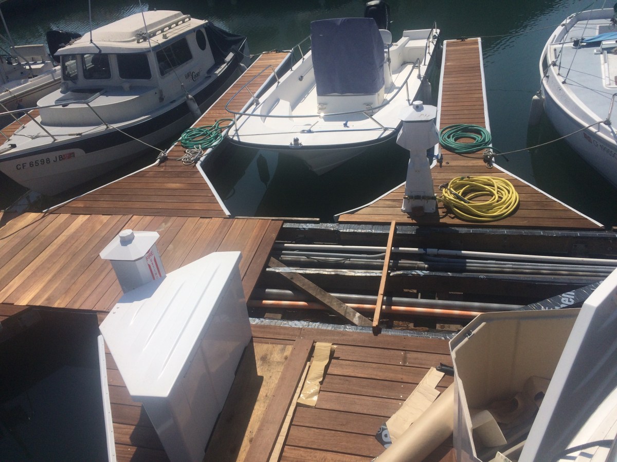Boat Life – Dock under construction and the dog who stole some&nbsp;Pizza